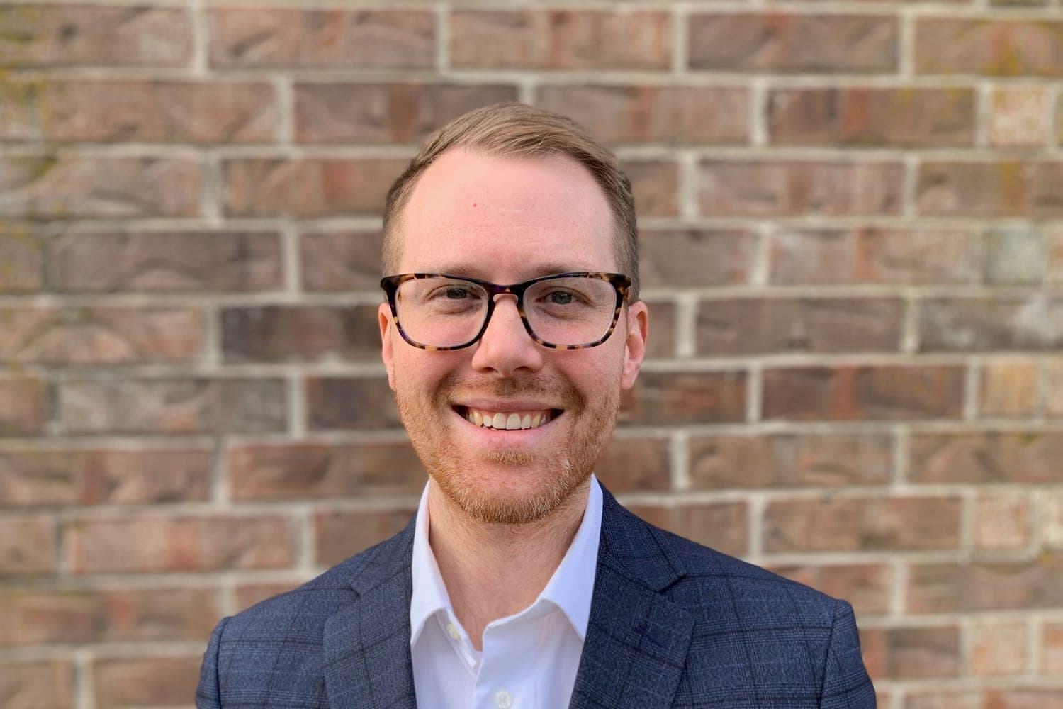 Portrait of Sam, Wine Hound's Fractional Chief Information Officer / Chief Technology Officer